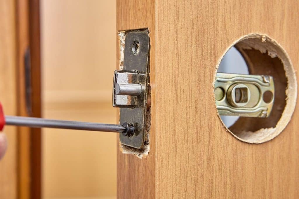 NSW owners corporation conflicting quotes common property doors repair replace