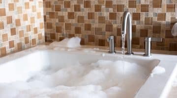 QLD body corporate recover repair costs tenant water damage