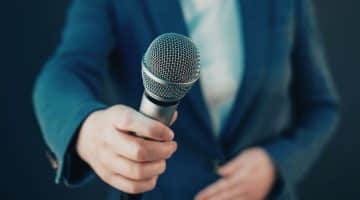 can owners vote to allow someone to speak at a body corporate agm qld