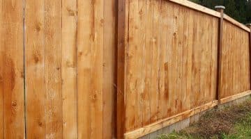 who pays for boundary fence replacement between lot and common property qld