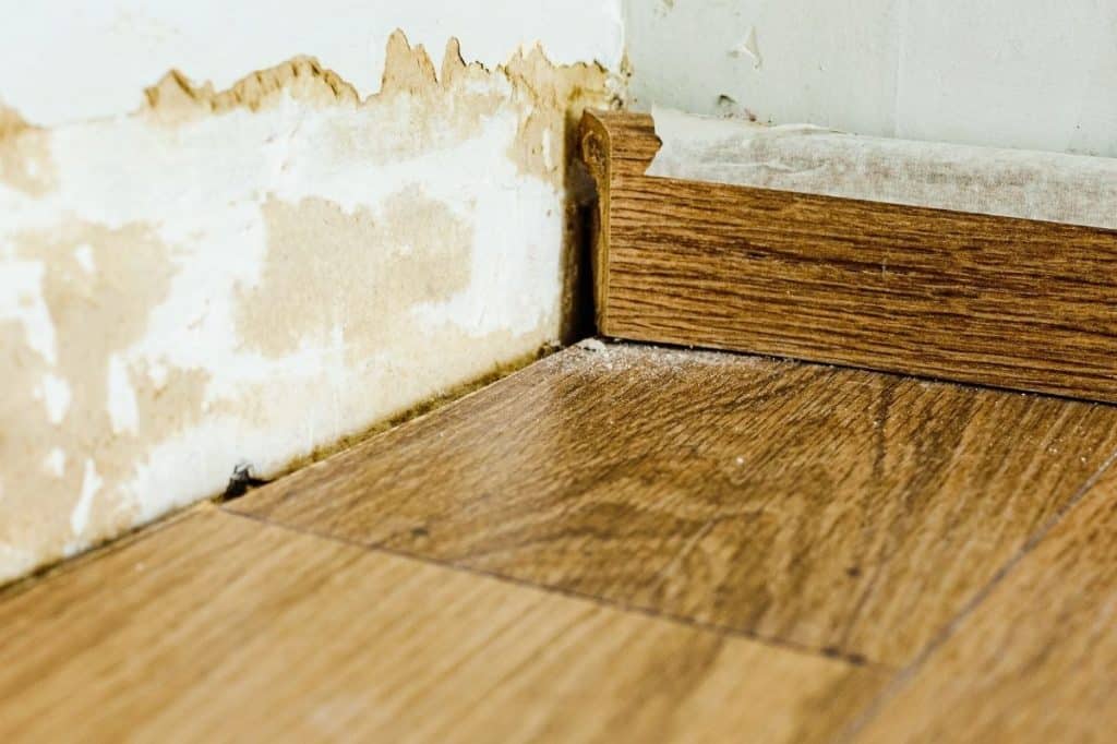 who pays for floor damage from common property pipe wa strata